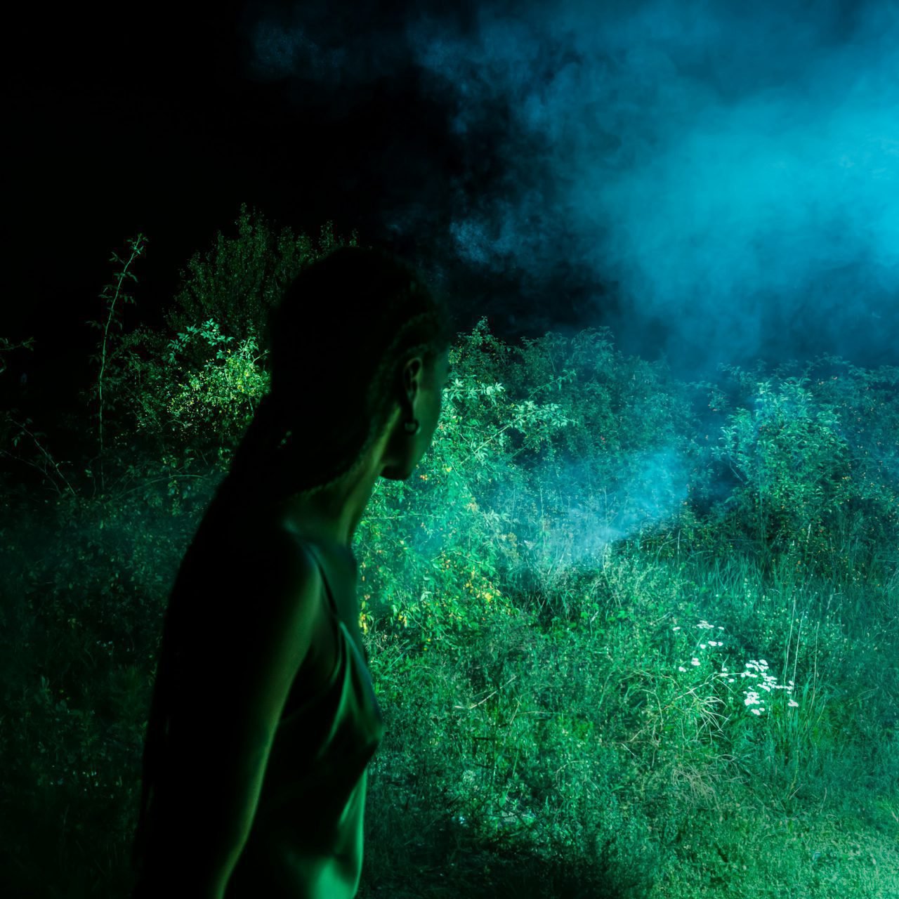 Woman of colour looking into the mist 