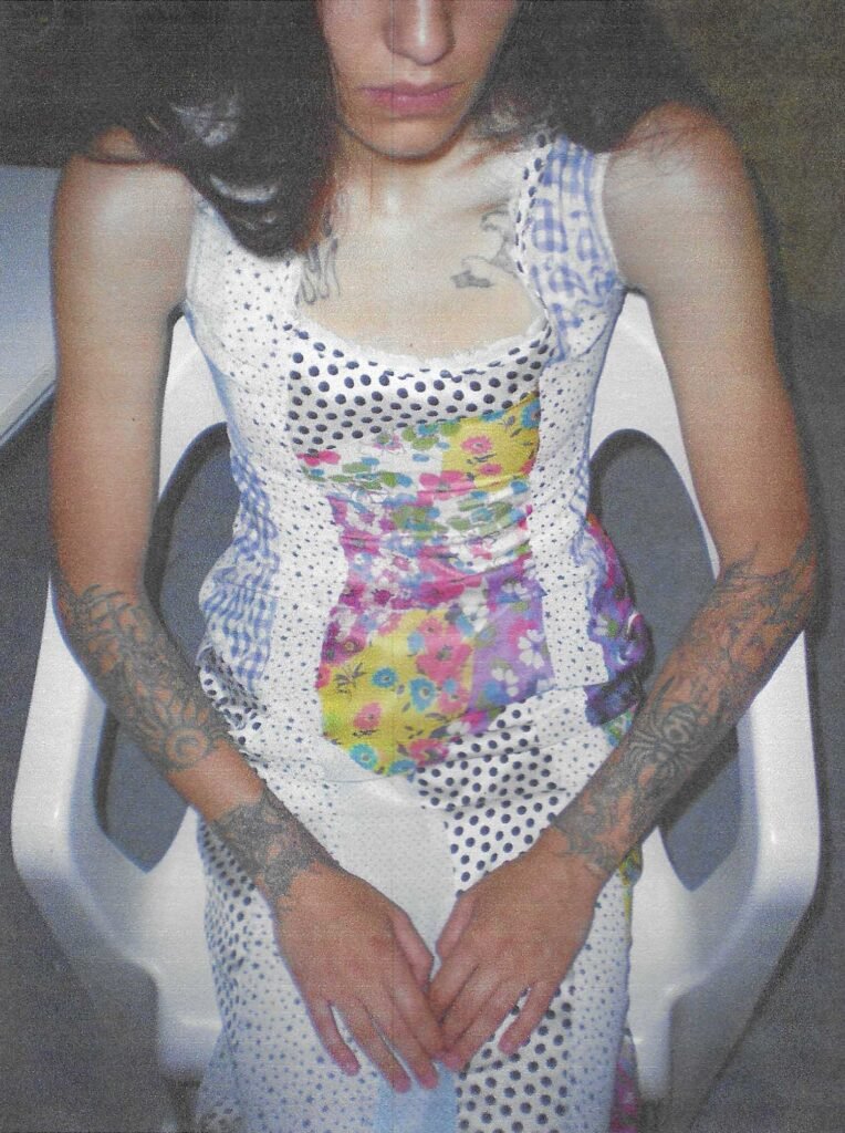 An analog image of a gorgeous upcycling gown by Garbage-Core