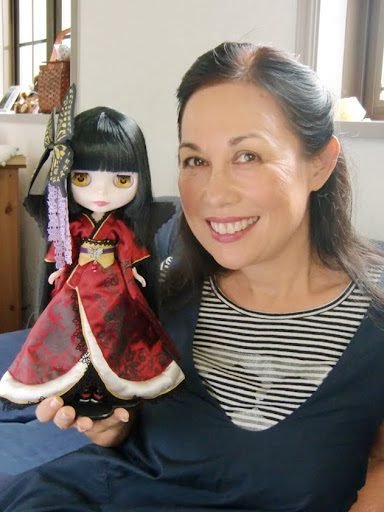 Junko Wong with an Asian inspired Blythe doll.