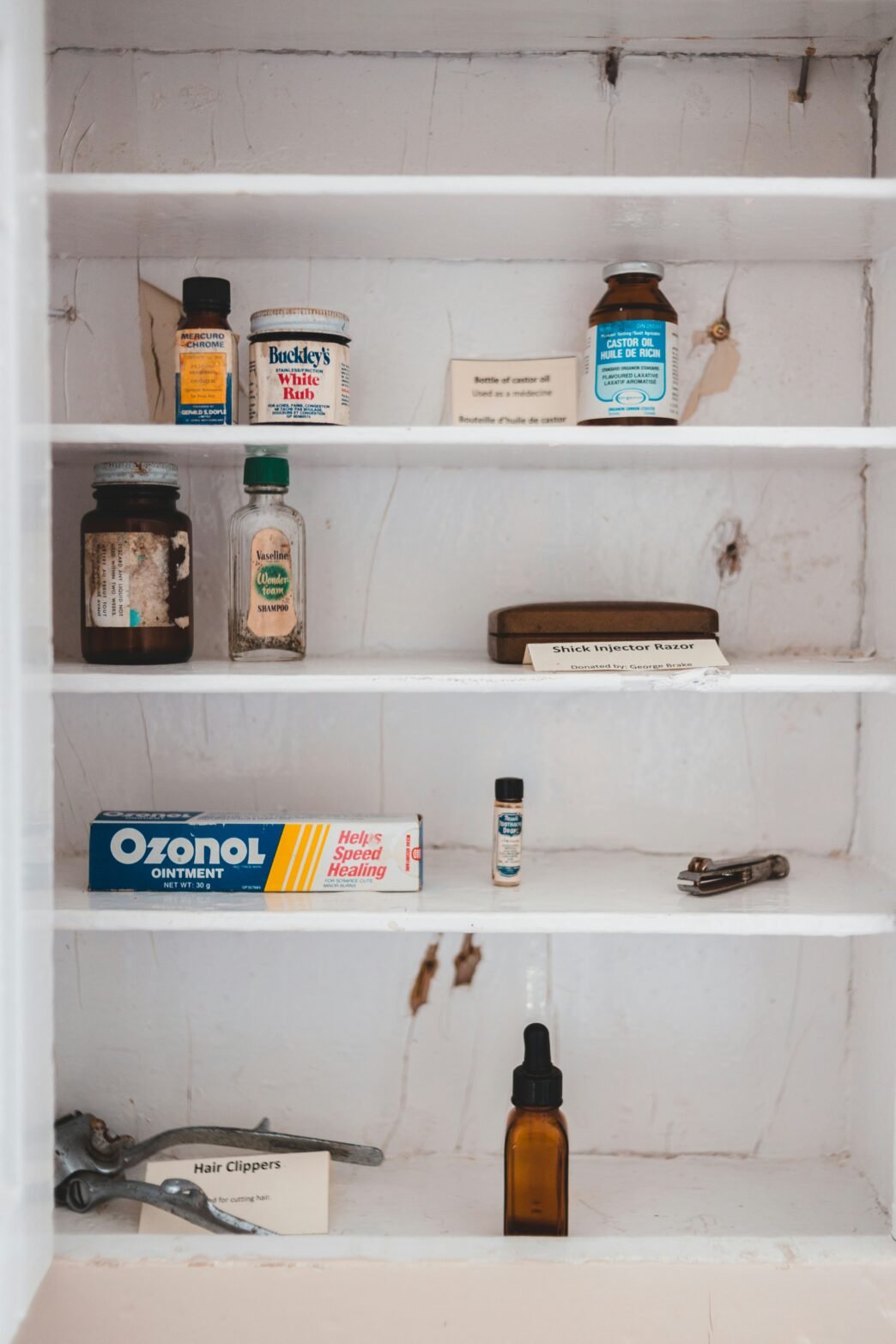 A half empty medicine cabinet.
