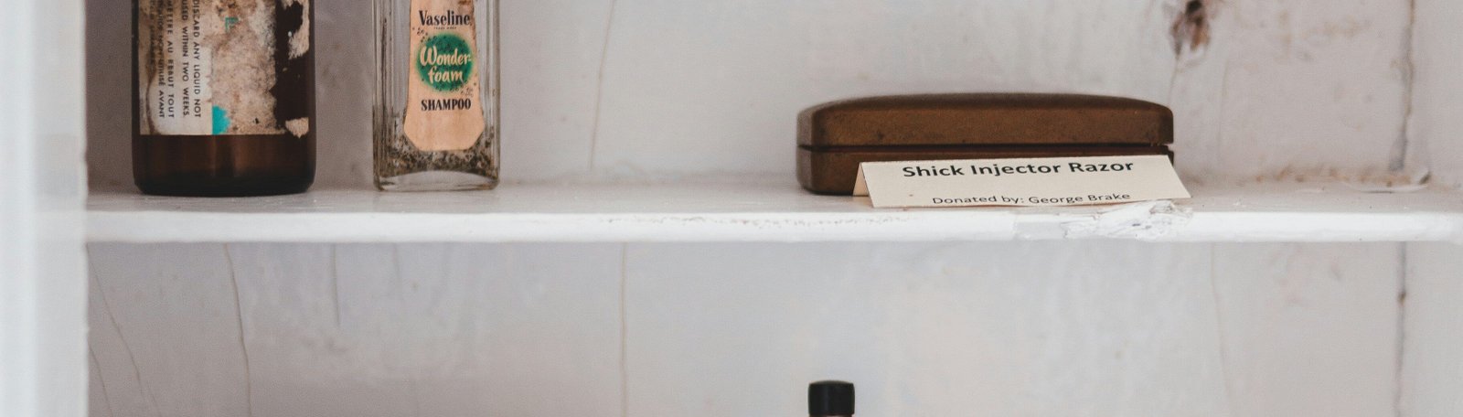 A half empty medicine cabinet.