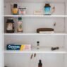 A half empty medicine cabinet.
