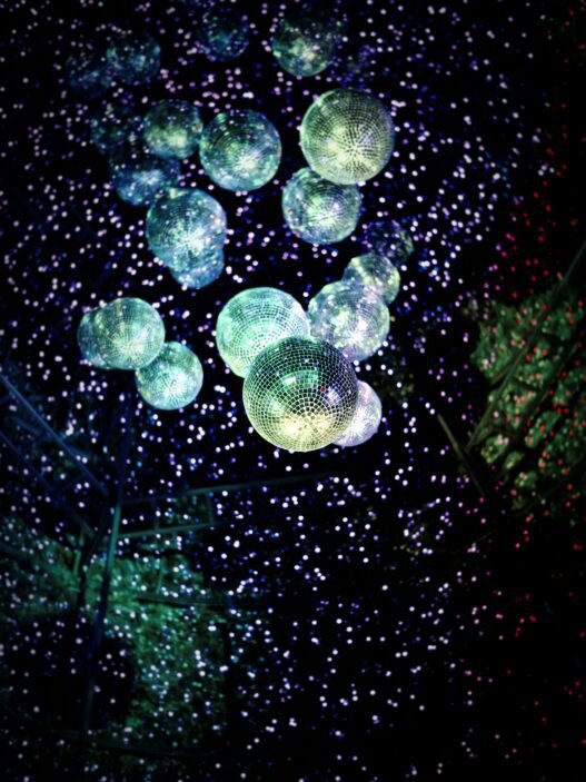 Disco balls in a darkened room