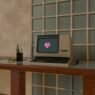 A vintage computer with a bitmoji heart on the screen.