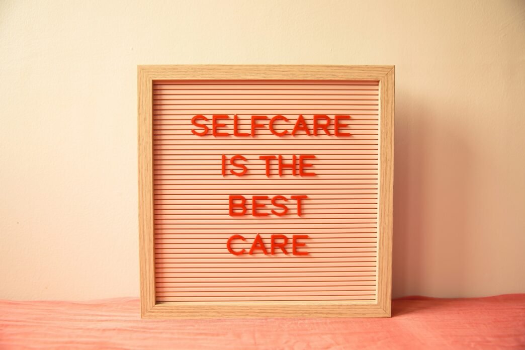 A bulletin board that reads "selfcare is the best care"