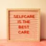 A bulletin board that reads "selfcare is the best care"